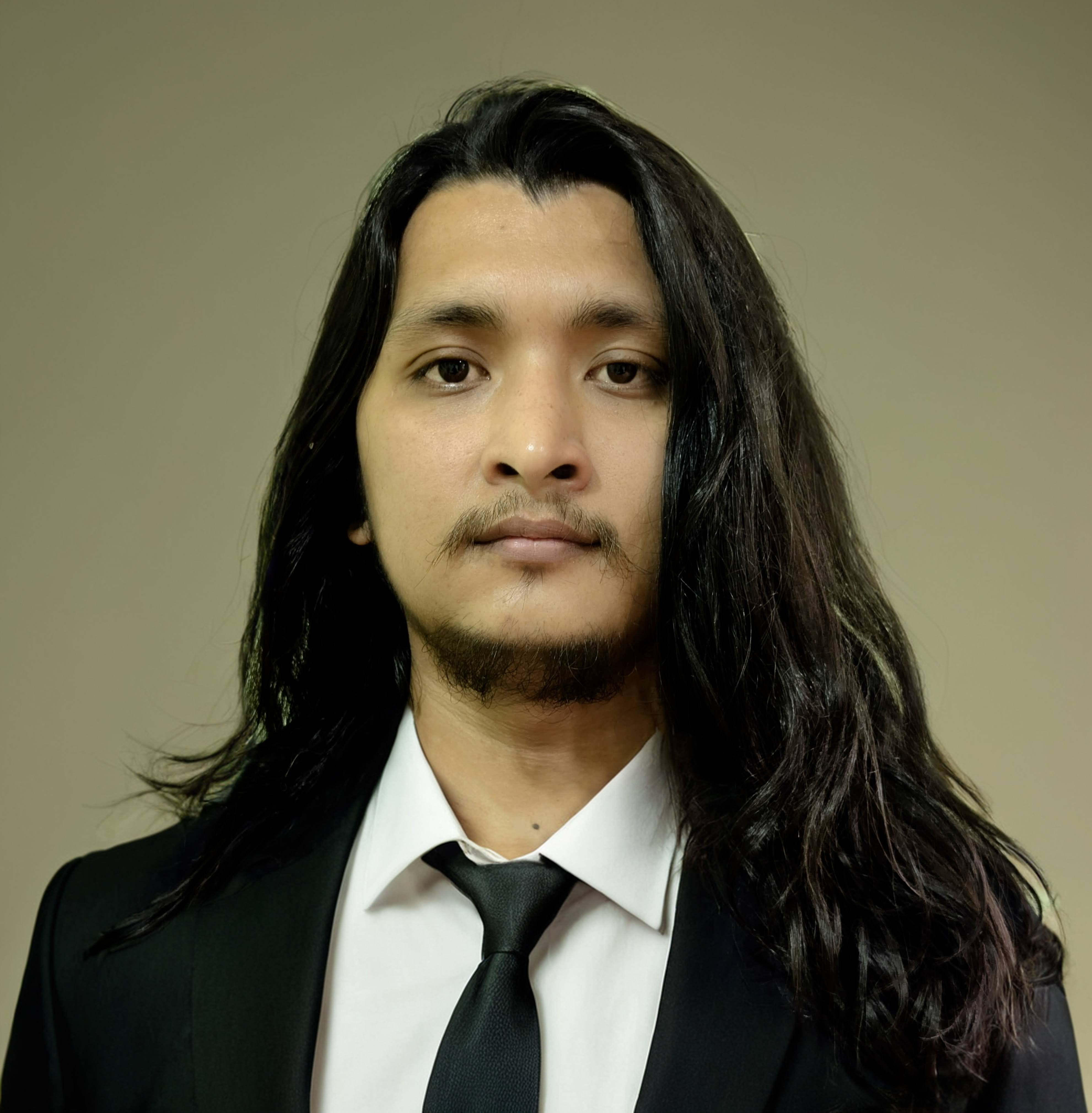 Professional headshot of Bigendra Shrestha, a software developer from Nepal